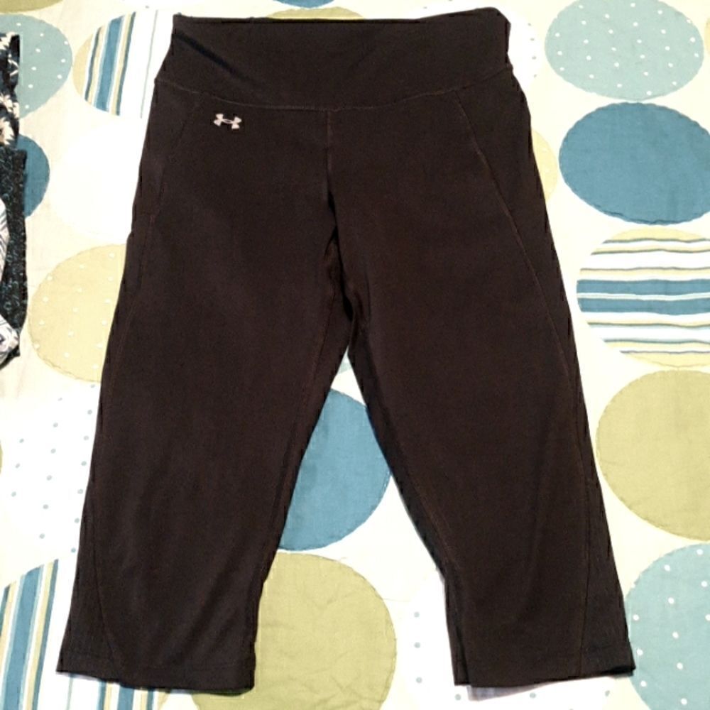 Under Armour, compression shorts. Side zippered pocket, high waist